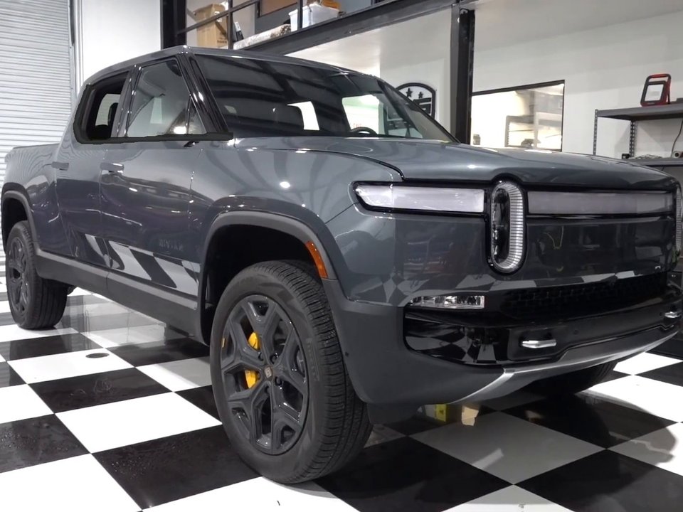 Rivian R1T electric pickup inside the EVS Motors service & collision bay