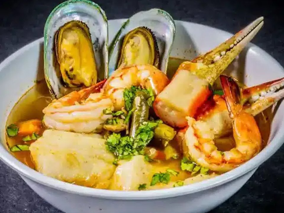 Cajun seafood boil with shrimp, mussels, corn, and crab legs at Mike's Seafood