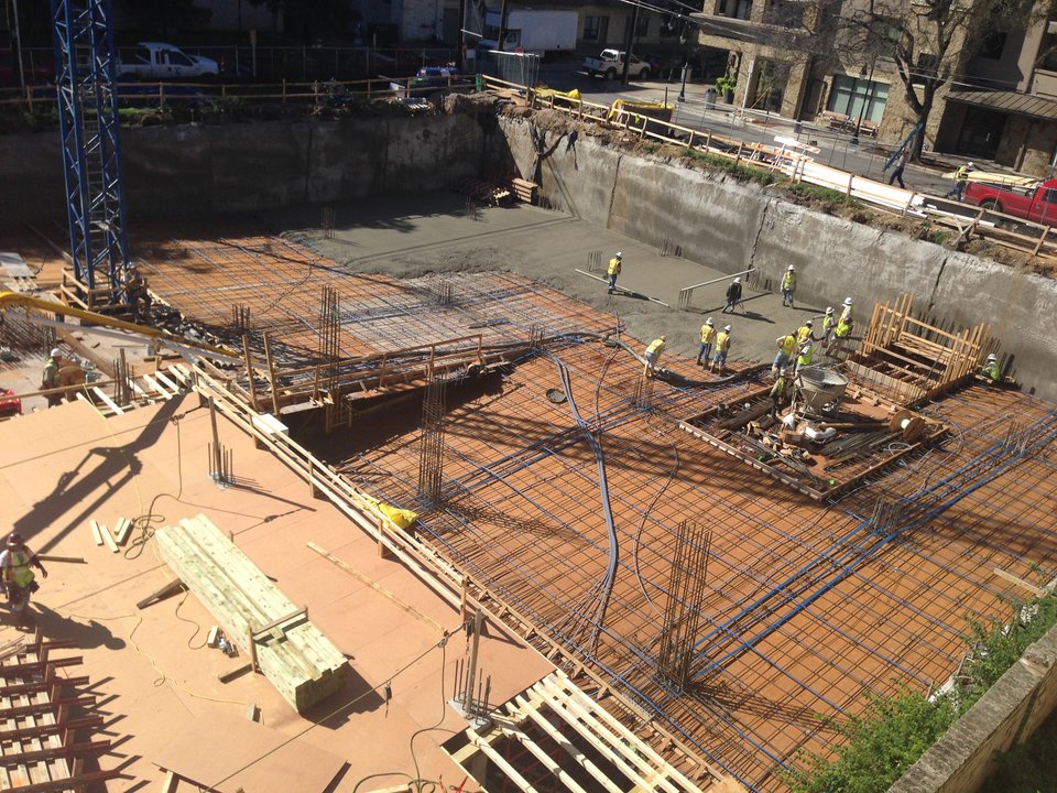 Trinity Elevated Enterprises crew finishing a large commercial concrete slab installation